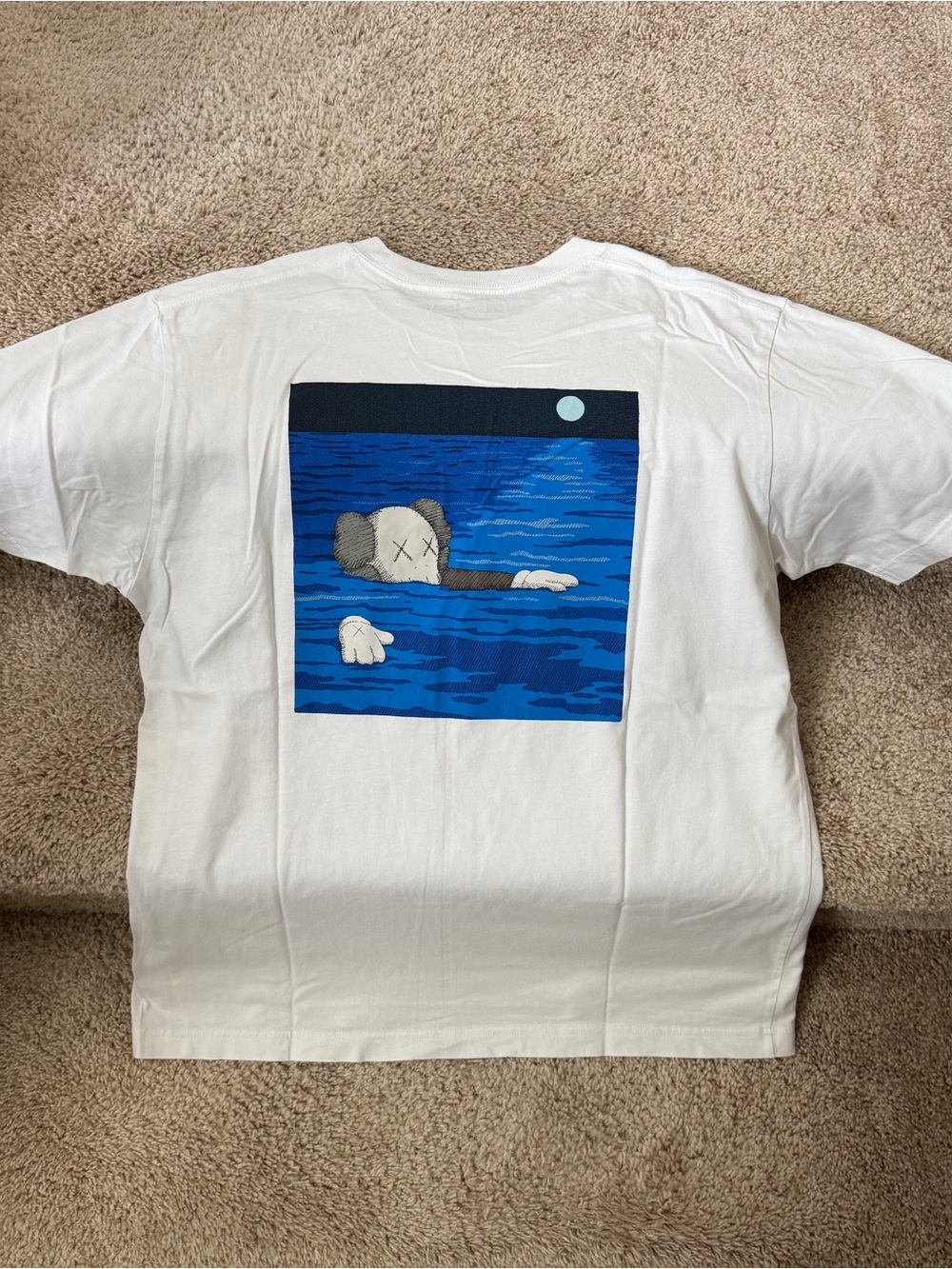 Uniqlo White Short Sleeve Tee with Blue Ocean Graphic